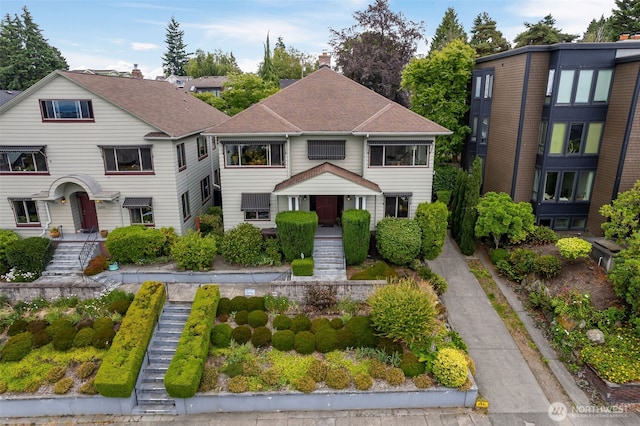 2016 Broadway E Unit B, Seattle, WA 98102 - view of front of home with stairway and a shingled roof