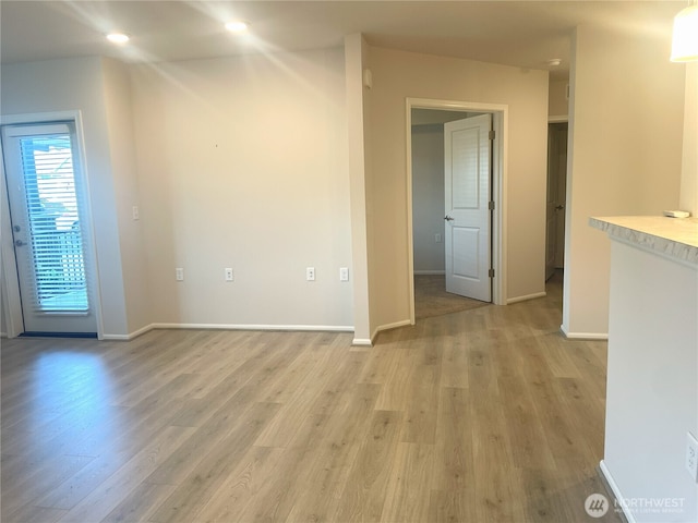 921 Westridge Way NE # 102, Issaquah, WA 98029 - unfurnished room featuring light wood-type flooring and recessed lighting