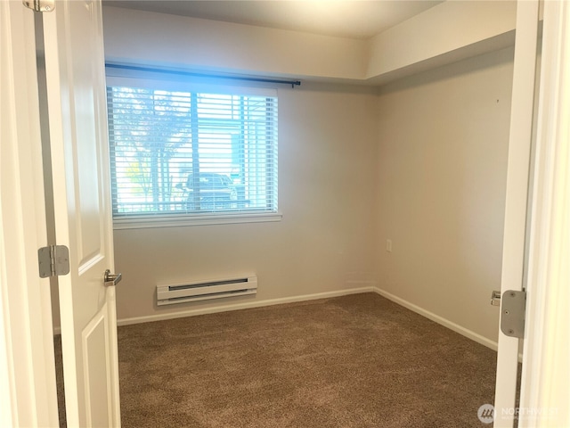 921 Westridge Way NE # 102, Issaquah, WA 98029 - unfurnished room featuring baseboard heating and carpet