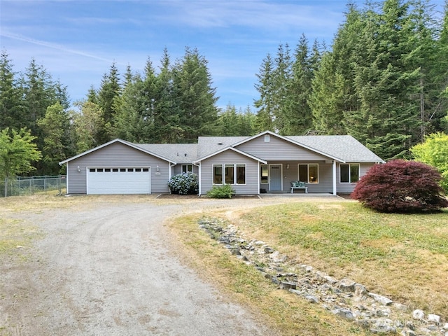 2733 Teal Lake Rd, Port Ludlow, WA 98365 - ranch-style home with dirt driveway, an attached garage, and a porch