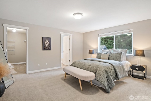 2733 Teal Lake Rd, Port Ludlow, WA 98365 - bedroom featuring carpet flooring, a spacious closet, and ensuite bath