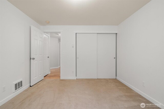 2733 Teal Lake Rd, Port Ludlow, WA 98365 - unfurnished bedroom with carpet and a closet