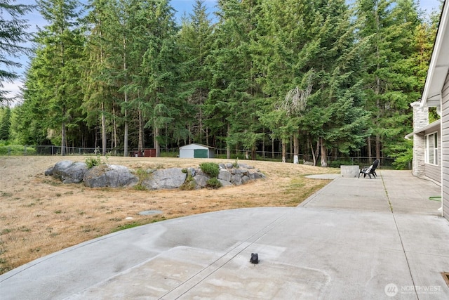 2733 Teal Lake Rd, Port Ludlow, WA 98365 - fenced backyard featuring a patio area and a shed