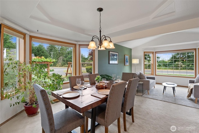 5207 170th St E, Tacoma, WA 98446 - dining area featuring light colored carpet, healthy amount of natural light, a chandelier, and a tray ceiling