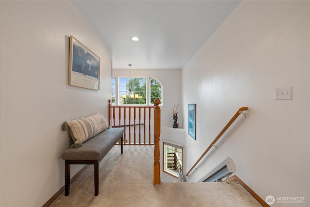 5207 170th St E, Tacoma, WA 98446 - corridor with an upstairs landing, light carpet, recessed lighting, and a chandelier