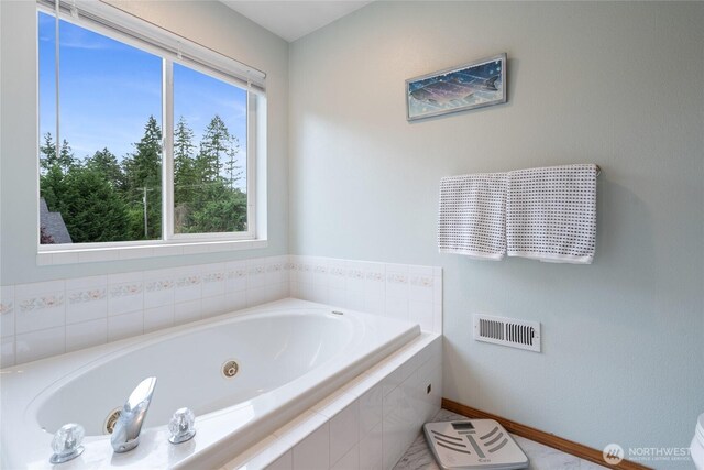 5207 170th St E, Tacoma, WA 98446 - full bathroom with a tub with jets and baseboards