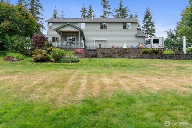 5207 170th St E, Tacoma, WA 98446 - view of front facade with a front lawn