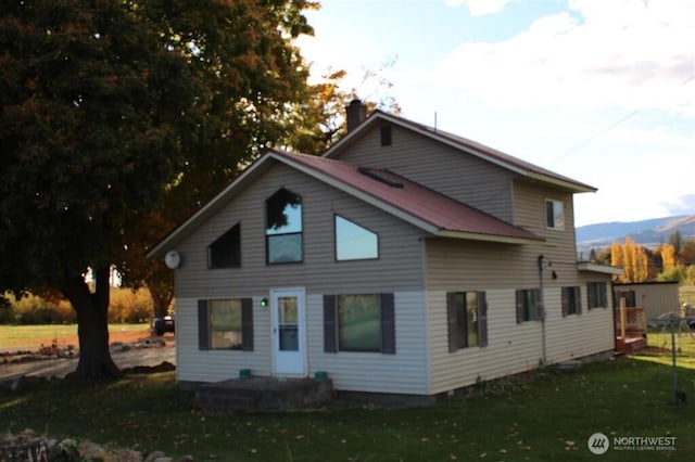 79 Duck Lake Rd, Omak, WA 98841 - view of front of property with a front lawn and a chimney