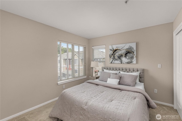 16107 NE 90th Way Unit 3304, Redmond, WA 98052 - bedroom with light colored carpet and baseboards