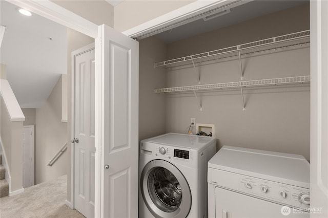 16107 NE 90th Way Unit 3304, Redmond, WA 98052 - laundry area with washer and clothes dryer and carpet flooring