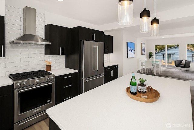 16547 NE 92nd Pl Unit 6A, Redmond, WA 98052 - kitchen featuring stainless steel appliances, wall chimney range hood, dark cabinetry, and light countertops