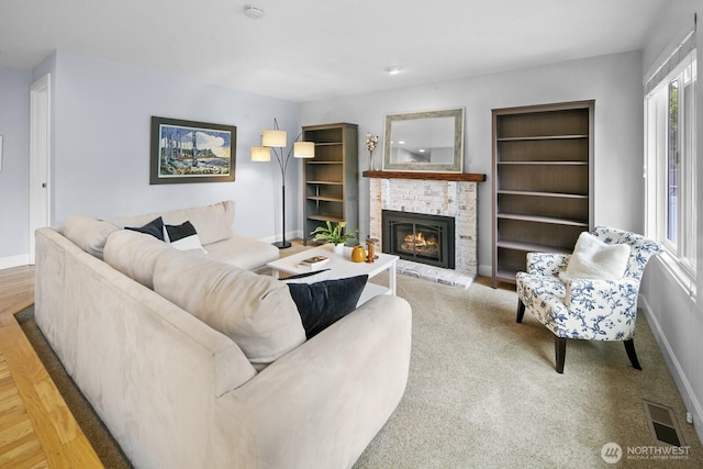 21227 SE 29th St, Sammamish, WA 98075 - living area featuring a brick fireplace and built in shelves