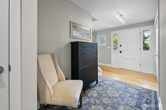 21227 SE 29th St, Sammamish, WA 98075 - entryway featuring wood finished floors and baseboards