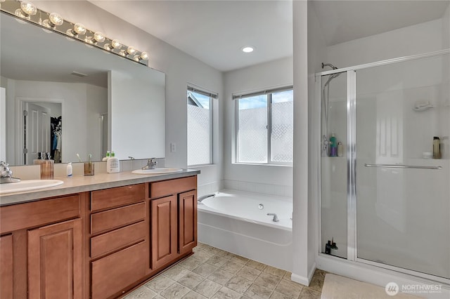 4023 Tribute Ave E, Fife, WA 98424 - bathroom with a stall shower, double vanity, and a garden tub