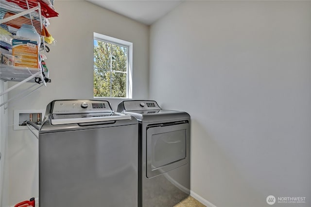 4023 Tribute Ave E, Fife, WA 98424 - laundry area with washing machine and dryer and baseboards
