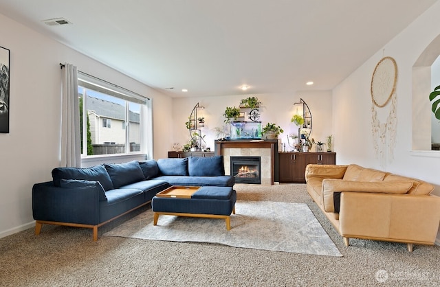 14410 99th Way SE, Yelm, WA 98597 - carpeted living room featuring a tiled fireplace and recessed lighting