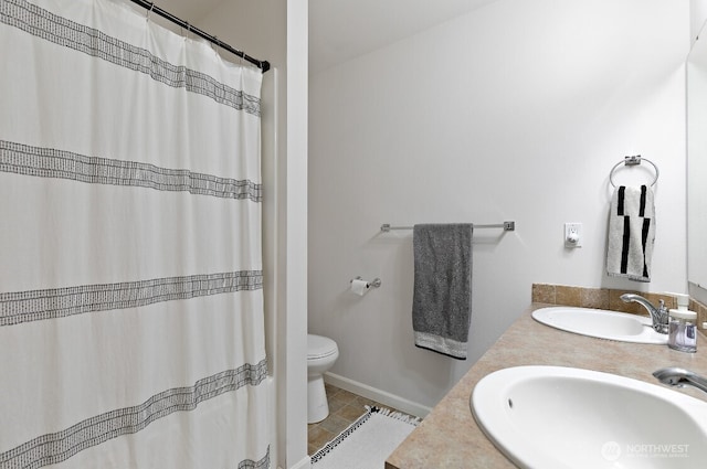 14410 99th Way SE, Yelm, WA 98597 - bathroom featuring double vanity, tile patterned floors, and a shower with curtain