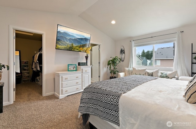 14410 99th Way SE, Yelm, WA 98597 - bedroom featuring a walk in closet, lofted ceiling, light carpet, a closet, and recessed lighting
