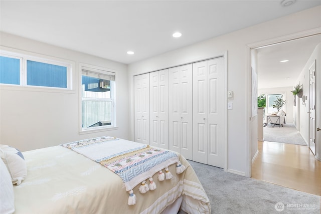 2241 13th Ave W, Seattle, WA 98119 - bedroom with light carpet, recessed lighting, and a closet