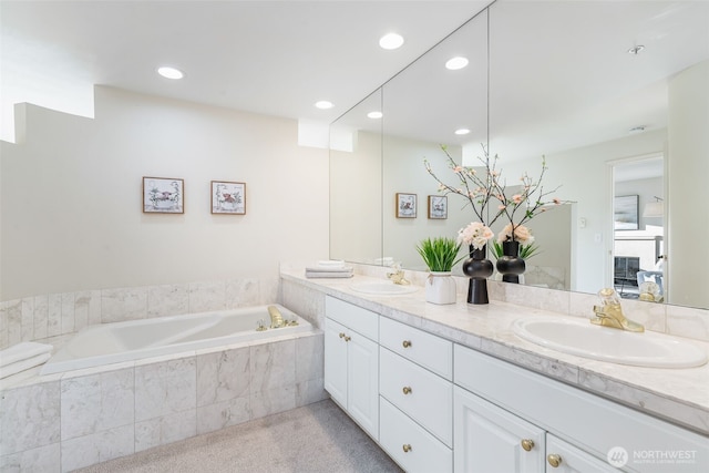 2241 13th Ave W, Seattle, WA 98119 - bathroom featuring double vanity, a bath, recessed lighting, and ensuite bath