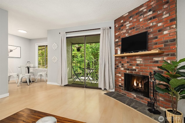 12023 100th Ave NE Unit C4, Kirkland, WA 98034 - living area with wood finished floors and a fireplace
