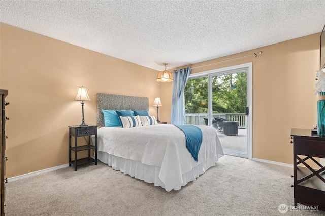 14531 262nd Ave SE, Issaquah, WA 98027 - bedroom with access to exterior, carpet floors, and a textured ceiling