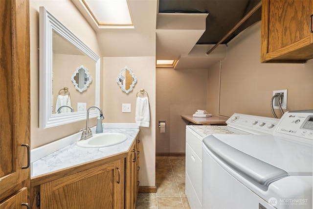 14531 262nd Ave SE, Issaquah, WA 98027 - washroom featuring washer and dryer and light tile patterned flooring