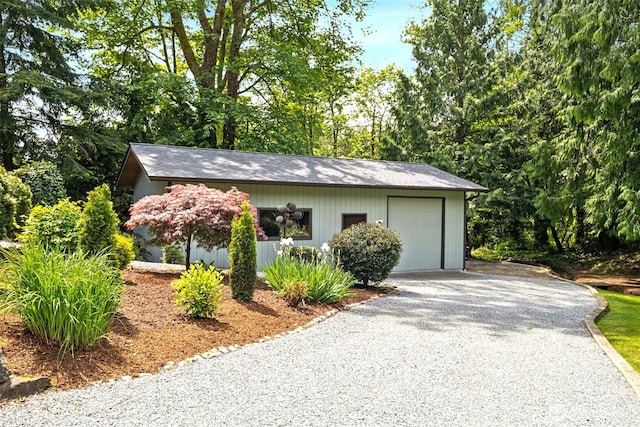 14531 262nd Ave SE, Issaquah, WA 98027 - view of front facade with driveway, a garage, and an outdoor structure