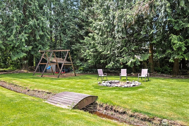 14531 262nd Ave SE, Issaquah, WA 98027 - view of green lawn with a playground and a fire pit