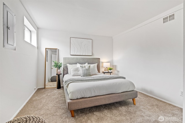 6719 46th Ave S, Seattle, WA 98118 - bedroom featuring light colored carpet and electric panel