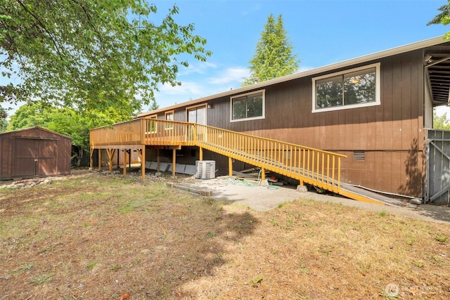 1102 Tule Lake Rd S, Tacoma, WA 98444 - rear view of property featuring a storage unit, stairway, and a deck