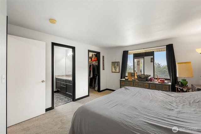 1521 90th Dr NE, Lake Stevens, WA 98258 - bedroom featuring light carpet, ensuite bathroom, a walk in closet, and a closet