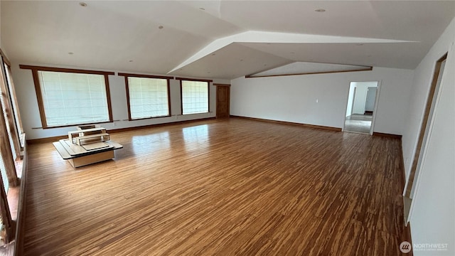 57 Covered Bridge Rd, Grays River, WA 98621 - unfurnished living room with wood finished floors and vaulted ceiling
