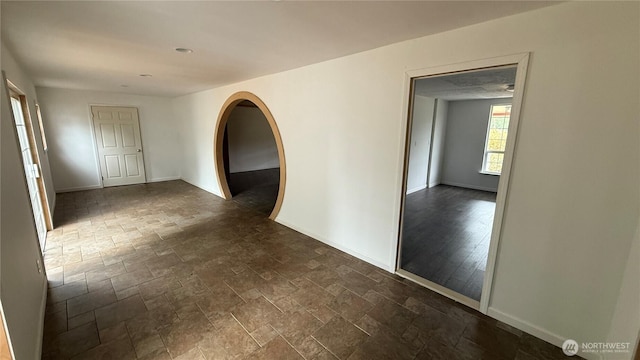 57 Covered Bridge Rd, Grays River, WA 98621 - spare room with stone tile flooring and baseboards
