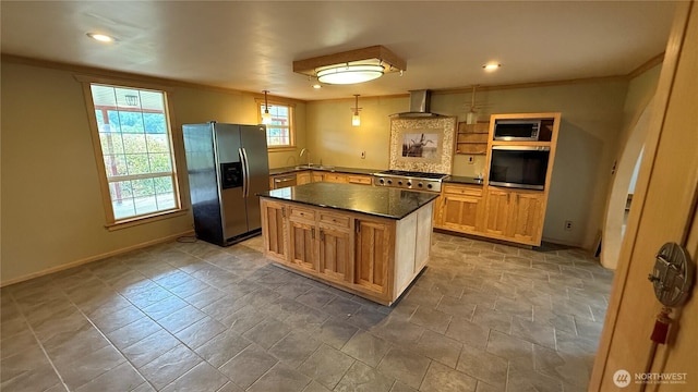 57 Covered Bridge Rd, Grays River, WA 98621 - kitchen with stainless steel appliances, dark countertops, crown molding, wall chimney exhaust hood, and stone finish flooring