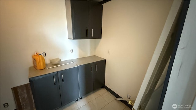 57 Covered Bridge Rd, Grays River, WA 98621 - laundry room featuring light tile patterned flooring