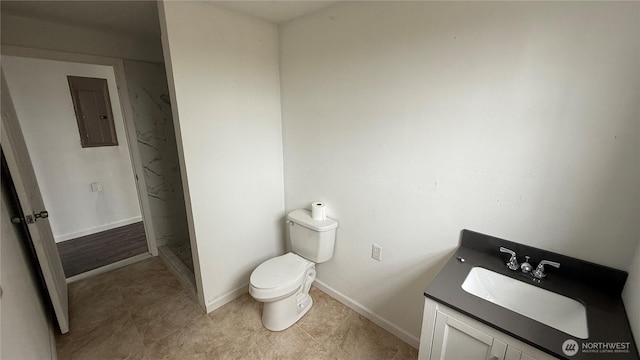 57 Covered Bridge Rd, Grays River, WA 98621 - bathroom featuring electric panel, vanity, a shower, and tile patterned flooring