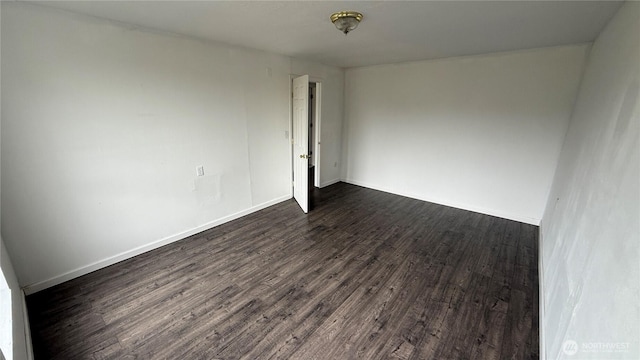 57 Covered Bridge Rd, Grays River, WA 98621 - spare room with dark wood-style flooring and baseboards