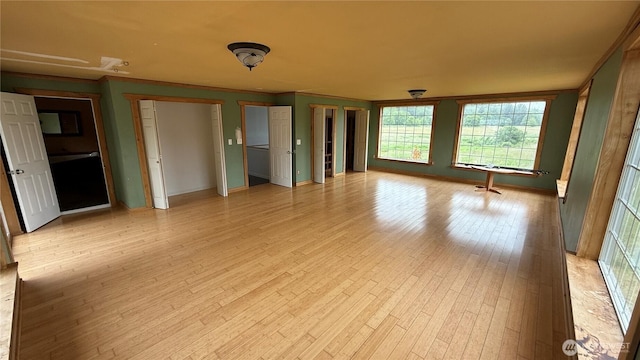 57 Covered Bridge Rd, Grays River, WA 98621 - unfurnished bedroom featuring light wood finished floors and two closets
