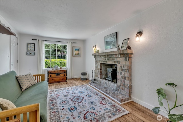 1400 Baby Doll Rd SE, Port Orchard, WA 98366 - living room with wood finished floors and a brick fireplace