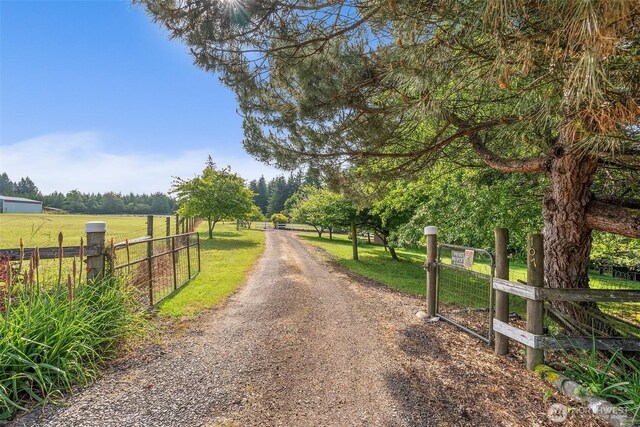 107 Gilbert Rd N, Onalaska, WA 98570 - view of dirt / gravel road featuring a rural view and a gated entry