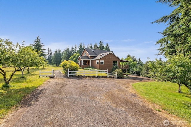 107 Gilbert Rd N, Onalaska, WA 98570 - view of front of house featuring driveway and a deck