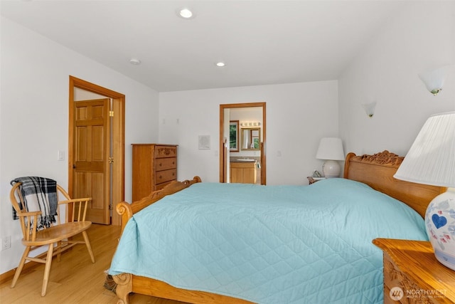 107 Gilbert Rd N, Onalaska, WA 98570 - bedroom with light wood-style floors, recessed lighting, and connected bathroom