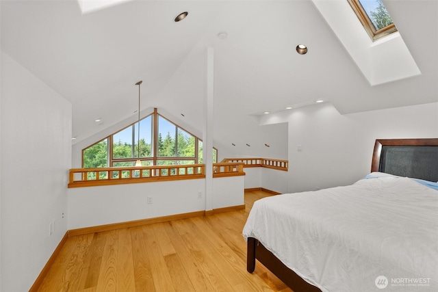 107 Gilbert Rd N, Onalaska, WA 98570 - bedroom with a skylight, lofted ceiling, light wood finished floors, and recessed lighting