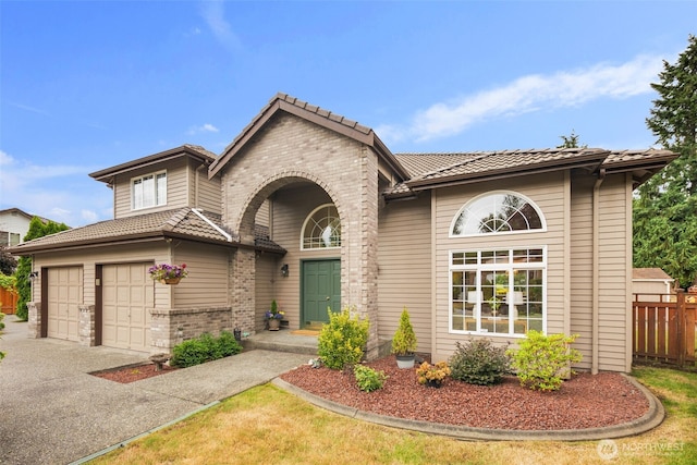 1514 232nd Pl SW, Bothell, WA 98021 - traditional home featuring a tile roof, driveway, an attached garage, and brick siding