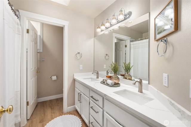 1514 232nd Pl SW, Bothell, WA 98021 - bathroom with double vanity and wood finished floors