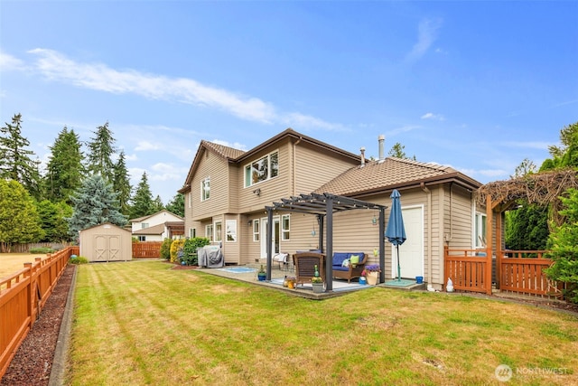 1514 232nd Pl SW, Bothell, WA 98021 - rear view of house with a storage unit, an outdoor living space, a pergola, a fenced backyard, and a patio