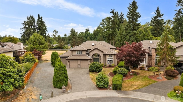 1514 232nd Pl SW, Bothell, WA 98021 - view of front of property featuring asphalt driveway, stucco siding, a garage, and a tile roof