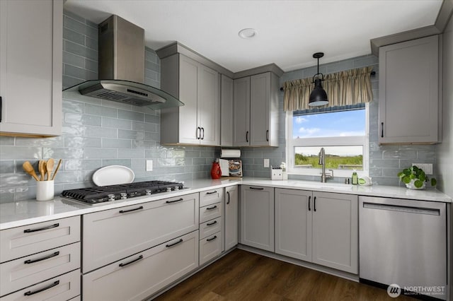 179 Perry Dr, Coupeville, WA 98239 - kitchen with appliances with stainless steel finishes, wall chimney exhaust hood, gray cabinets, light countertops, and dark wood-style floors