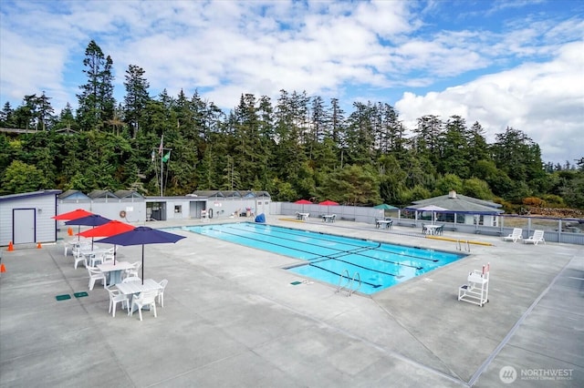 179 Perry Dr, Coupeville, WA 98239 - community pool with a patio area and view of scattered trees